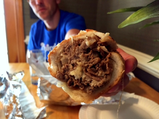 In a classic cheese steak, melted cheese binds just enough sharpness and fat to bring out the beefy, well-browned flavors of the just-chopped meat -- all piled in a fresh, crusty bun. / Courtesy of 22ndandphilly.com 